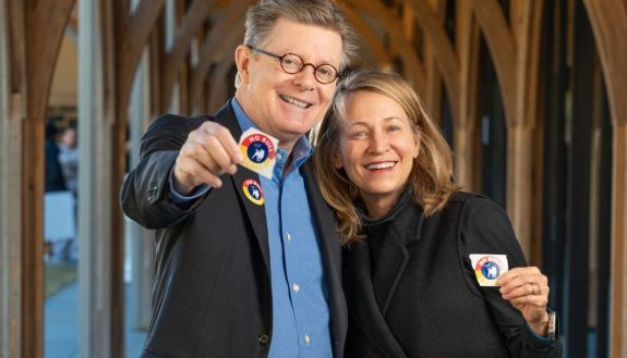 Vince and Annette Price show off their I voted stickers