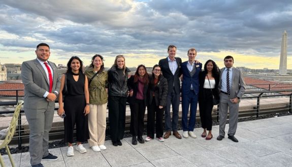 Students standing on a roof in New York