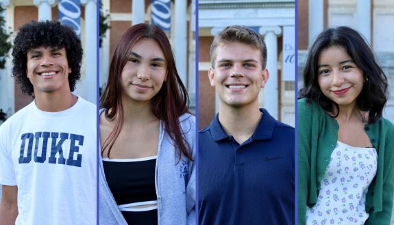 Four students looking at the camera