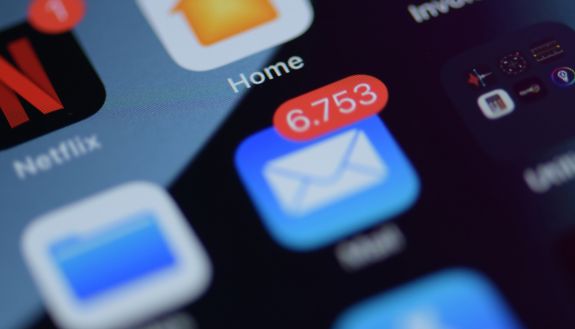 An email icon on a smart phone