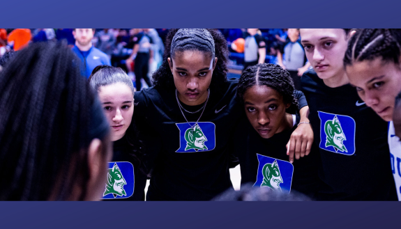 Women's basketball team in recycled shooting shirts.