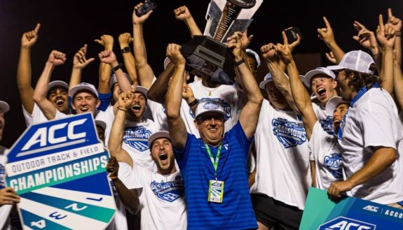 A group of people cheering