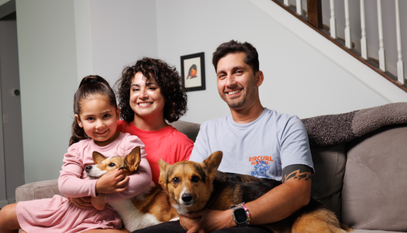 Family sitting on a couch