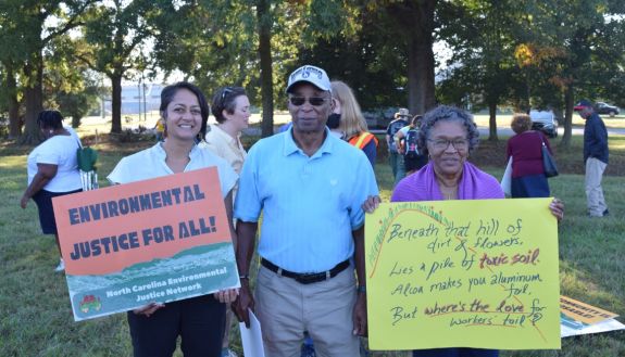 Protestors carrying signs