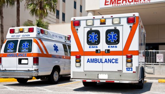 ambulances in front of an emergency department