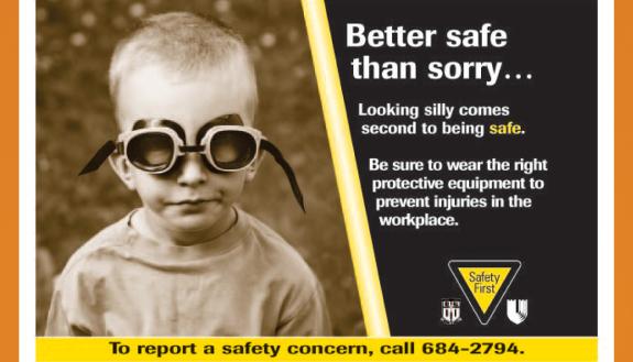 A 2006 safety sign created by the Office of Communication Services shows off the importance of wearing personal protective equipment. Working@Duke file photo.