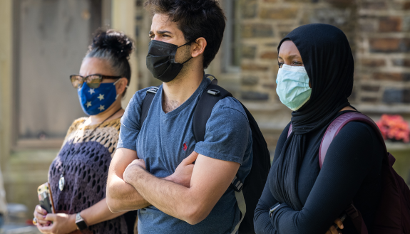 Members of the Duke community listen at Wednesday's vigil remembering George Floyd and other victims of police violence. Photo by Bill Snead