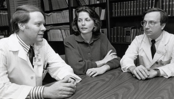 Archival photo of Joseph Moore, MD, (unknown woman) and Bill Peters, MD (courtesy Duke Medical Archives)