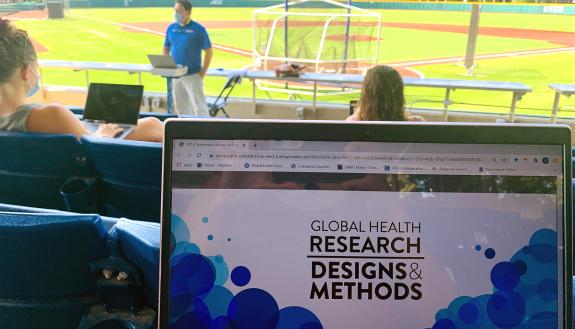 Eric Green leads a class discussion at Jack Coombs Field.