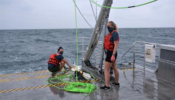 Researchers prepare to launch magnetometer from the deck fo the R/V Shearwater during a recent trip to search for shipwrecks. Photo courtesy of Matthew Dawson.