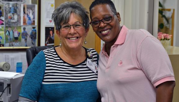 After Shy Smith was struck by a car, Sharon Rhodes ran to her aid.