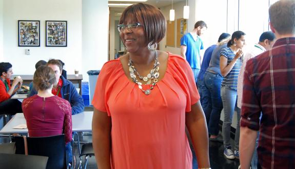Karem Jackson helps visitors at a conference at the Statistical and Applied Mathematical Sciences Institute. 