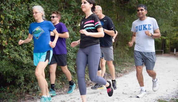 Participants of the Duke Run/Walk Club workout on the Al Buehler Trail. Photo by Les Todd.