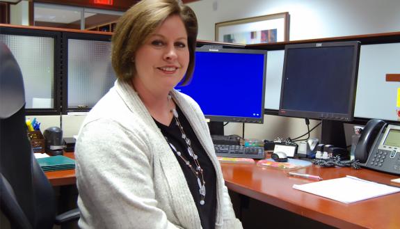 Corrine Starke at her desk.