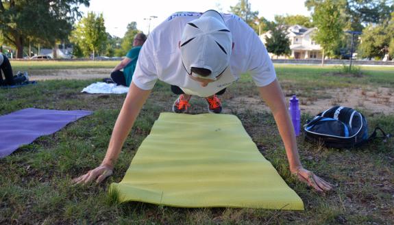 Jonathan Black does a push-up during a strength class part of Duke's Run/Walk Club.