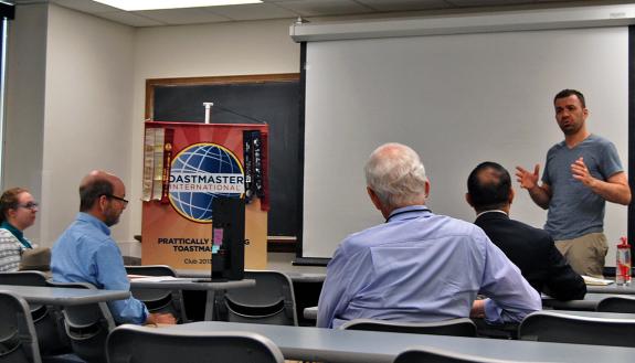 Dani Levin speaks at a meeting of the PRATTically Speaking Toastmasters Club. Photo by Stephen Schramm.