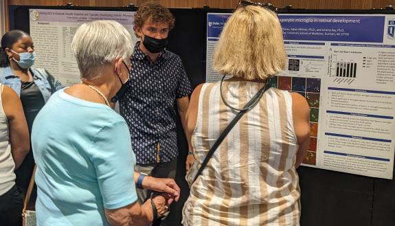 Summer neuroscience student Dillon presented his findings in a scientific poster session. 