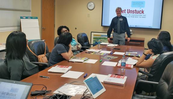 Don Shortslef, senior practitioner with Learning & Organization Development, talks with a group from Duke Raleigh Hospital. Photo courtesy of Adia Ross.