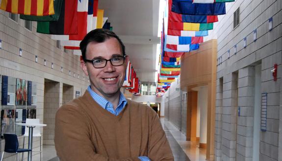 Greg Phillips, a communications manager at the Fuqua School of Business, joined the staff at Duke after 12 years spent working at daily newspapers. Photo by Stephen Schramm.