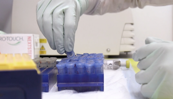 lab worker working on HIV vaccine