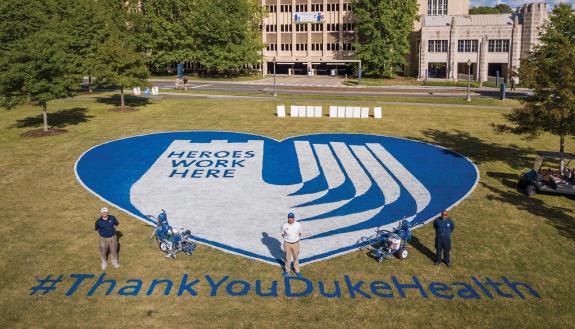 Duke University Facilities Landscape Services Athletics team created an appreciation message in April on the Duke Medicine Circle Lawn. Photo by Bill Snead, University Communications.
