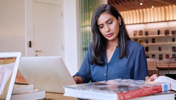 Woman at a computer.