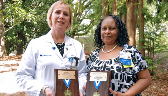 Duke Radiology's Marie Stone, left, and Duke Regional Hospital's René Livingston Flowers were honored as Return-to-Work MVPs.
