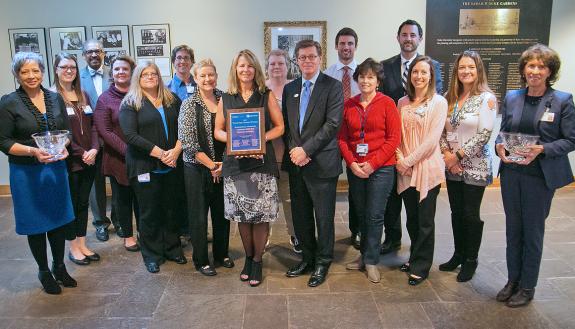 Duke President Vincent E. Price stands with the 2017 Teamwork and Diversity Award winners.