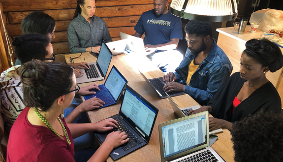 Members of the Writing and ReseArch Productivity (WRAP) Group for Underrepresented Faculty take part in a writing retreat. (From left: Sarah Gaither, Gustavo Silva, Sherilynn Black, Tyson Brown, Robert Turner, Jarvis McInnis, Sally Nuamah, Jean Beaman)