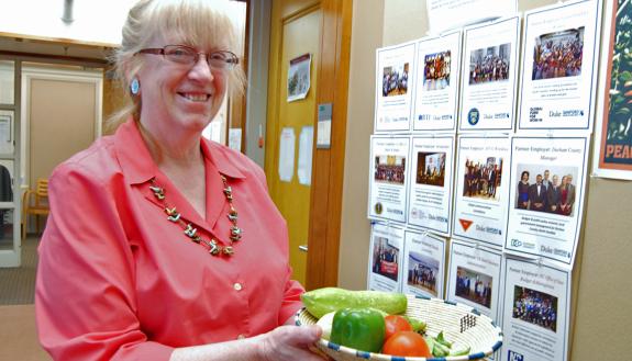 The Sanford School of Public Policy's Marion Pratt is known for occasionally bringing vegetables from her garden in for colleagues. Photo by Stephen Schramm.