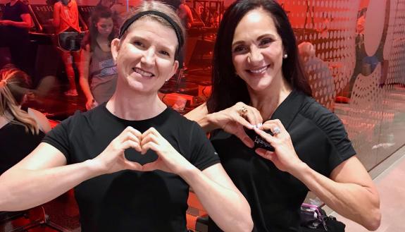 Stacy Sabraw, left, with the founder of Orangetheory Fitness, Ellen Latham, after a Valentine's Day workout class in Durham. Photo courtesy of Stacy Sabraw.
