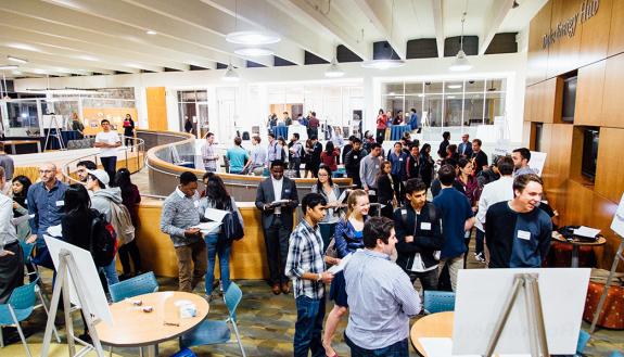 Students meet alumni entrepreneurs at the StartupConnect Networking Fair. Photo by Pilar Tiimpane