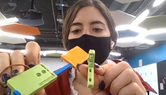 Alina Suarez designed an automated door for her Bass Connection team's test strip dispenser