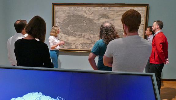Kristin Huffman, center, discusses Jacopo de’ Barbari’s View, which depicts Venice around 1500.
