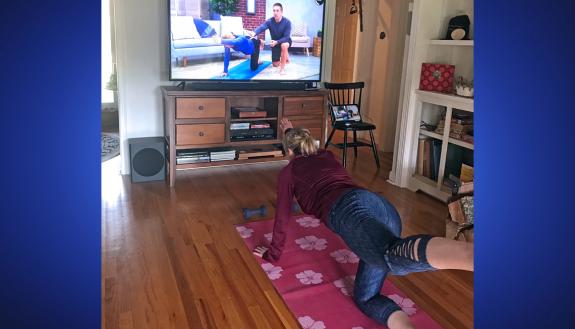 Beth Evans participates in a yoga class at home using Wellbeats. Photo courtesy of Beth Evans.