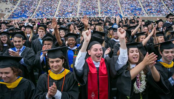 Students celebrate the awarding of degrees during commencement