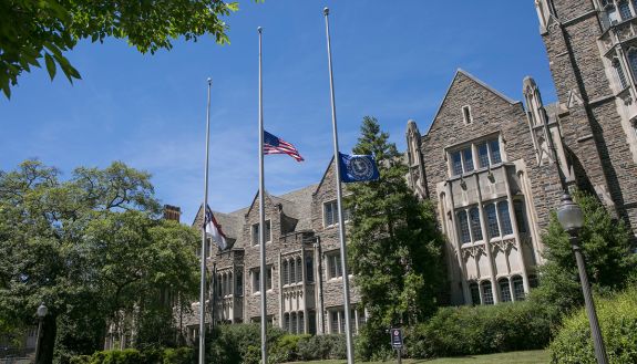 photo of flags lowered on campus from 2019