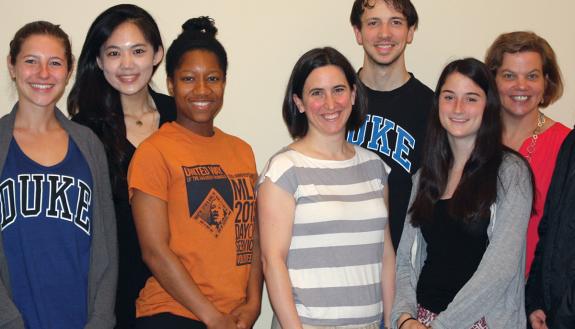 Anna Gassman-Pines, shown with students in the Bass Connections' Education and Human Development theme.