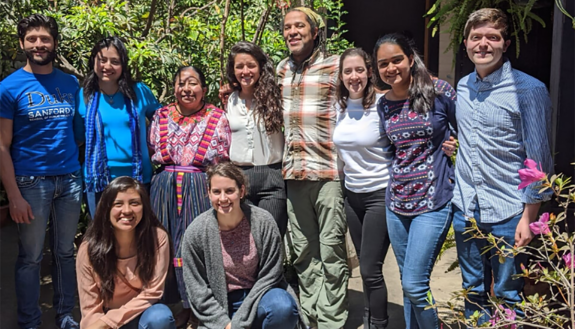 Members of the Migration and Deportation team meet with two community activists in Guatemala to discuss the local impact of migration. (Photo: Courtesy of Maria Ramirez)