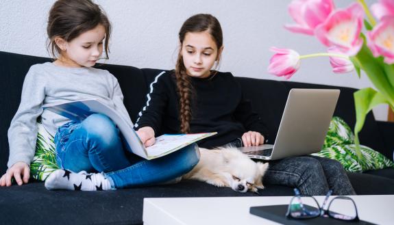 Kids sitting on a couch.