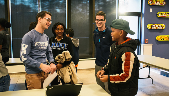 Duke students in a Bass Connections team that taught local middle schoolers open coding.