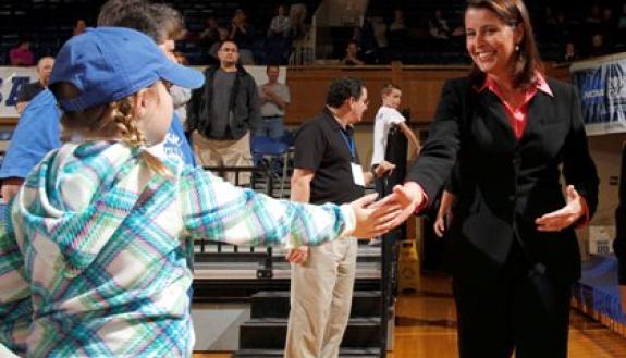 Women's basketball coach Joanne P. McCallie greets fans. Photo by Duke University Photography. 