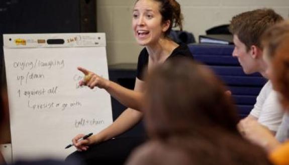 Physical theater performer Kali Quinn talks with Duke students during a recent workshop on campus.