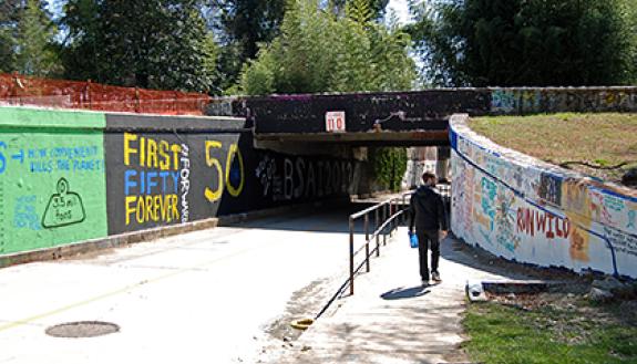 The section of West Main Street that runs along East Campus will be closed for five months as part of a state transportation project to demolish and rebuild the "graffiti bridge," which was built in 1950 and runs over Campus Drive. Photo by Leanora Minai