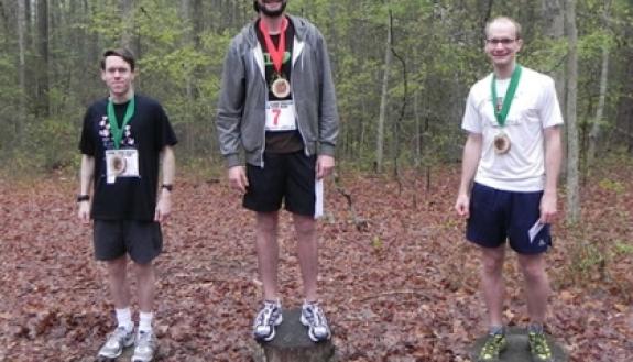 Pictured from left to right are the top male runners from 2011: David Powers (third place) from Alexandria, Va., and Duke students Joshua Strauss (first place) and Nicholas Turner (second place).  Photo courtesy of Duke Forest.
