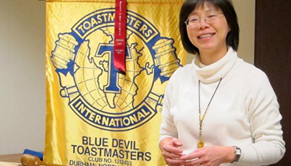 Edie Chung giving a speech at the Blue Devil Toastmasters Club. Photo by Marsha A. Green.