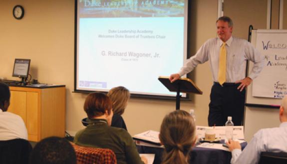 Rick Wagoner, chair of Duke's Board of Trustees, presents to members of Duke's Leadership Academy. Photo by Bryan Roth.
