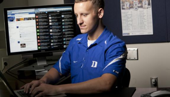 Dave Bradley, Duke basketball's recruiting/communications coordinator, uses Twitter, YouTube and other channels to engage fans. Photo by Duke Photo.