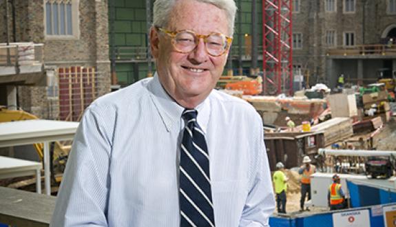 Tallman Trask III, executive vice president, stands in front of the West Union.