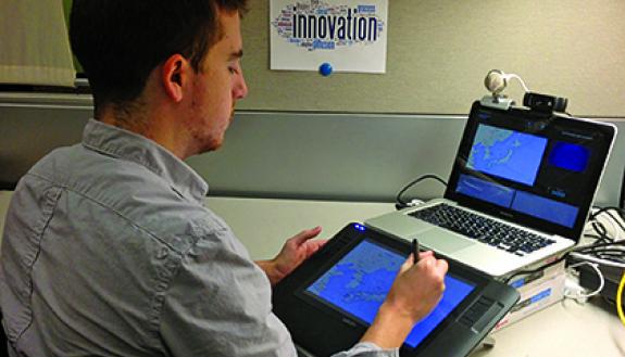 Mich Donovan of the Duke Digital Initiative (DDI) uses a video laptop kit, which faculty can check out from the Link on the lower level of Perkins Library. The kit includes a Mac laptop, Wacom tablet that can be used to annotate presentation slides, a we